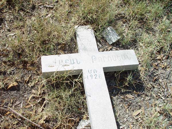 Vartan Torrosians cross, knocked over