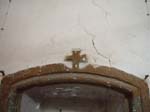 Cross above door