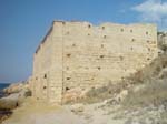 Carob warehouse on beach 1
